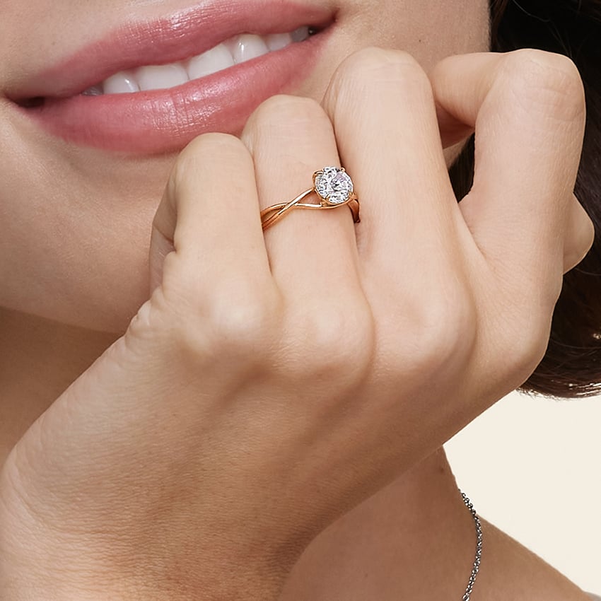 Alya Emerald Twist Solitaire Engagement Ring