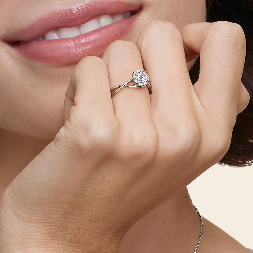 Alya Emerald Twist Solitaire Engagement Ring