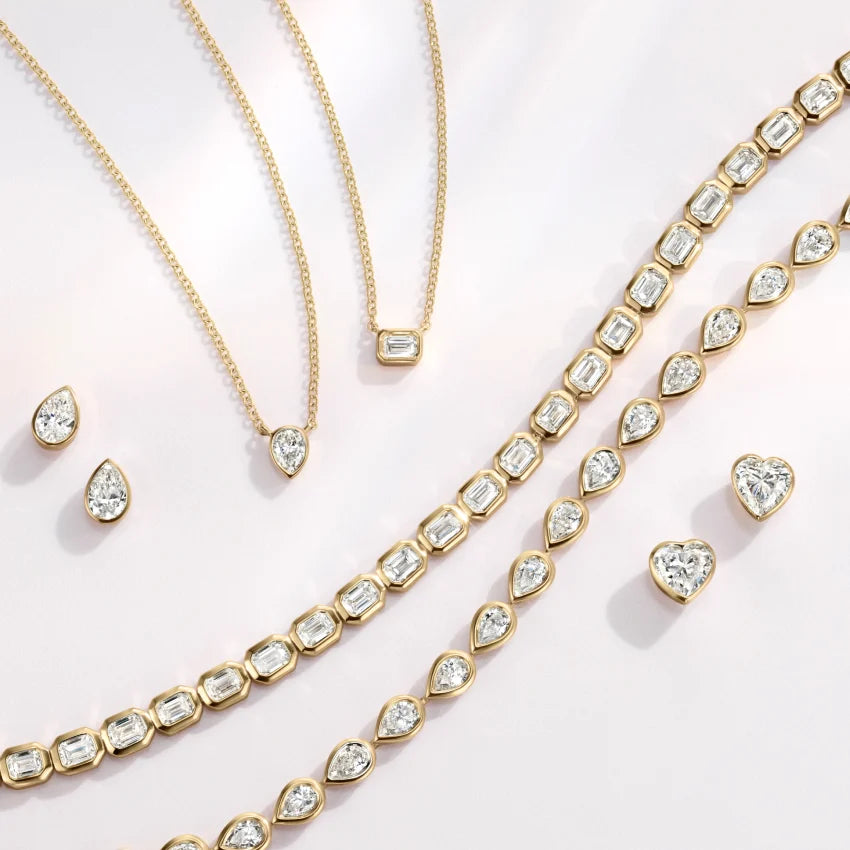 Тенісний браслет з діамантами Bezel Emerald Cut