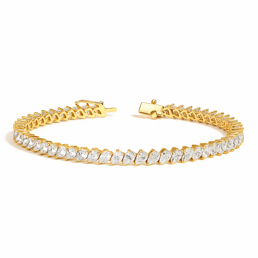 Тенісний браслет з діамантами Angled Pear Cut